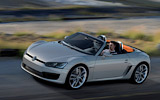 Volkswagen Concept BlueSport. Prototipo 2009. Imagen. Exterior. Frontal lateral. Coche en movimiento. Carretera. Gris.