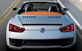 Volkswagen Concept BlueSport. Prototipo 2009. Imagen. Exterior. Posterior. Coche en movimiento. Carretera. Gris.
