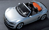 Volkswagen Concept BlueSport. Prototipo 2009. Imagen. Exterior. Frontal lateral cenital. Coche parado. Carretera. Gris.