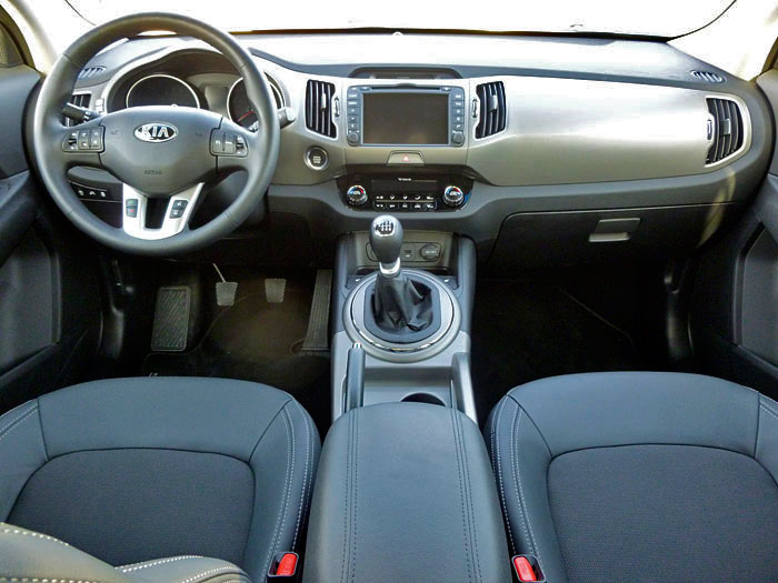KIA Sportage. 2014. Consola central y salpicadero