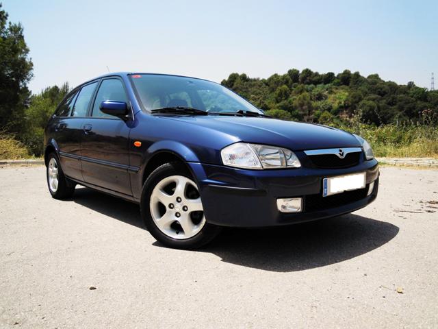 Mazda 323f (2001). Frontal
